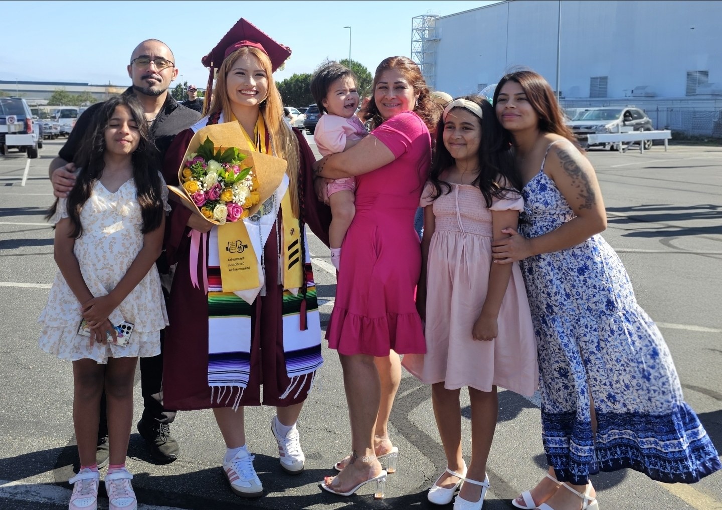 Jose and his family at a graduation